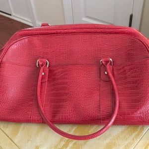 Red overnight bag. Great for traveling.